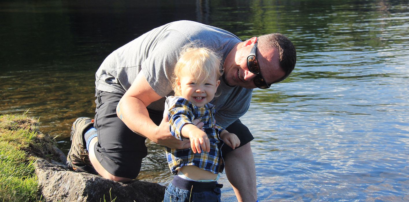 Franklin Antoian and his son at the lake