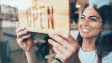 Woman opening business after reaching financial goals during covid.