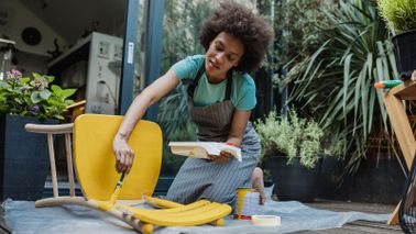 woman-painting-chair-April-buy-skip
