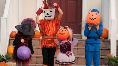 Budget hacks for hosting a halloween party kids in costumes