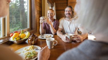 Couple that has moved in with parents to save money.