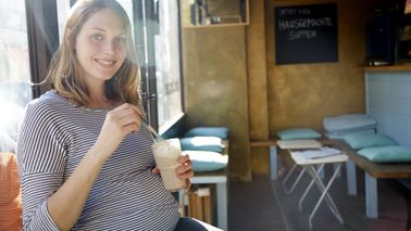 Pregnant woman drinking a smoothie and wondering how long does short-term disability last.