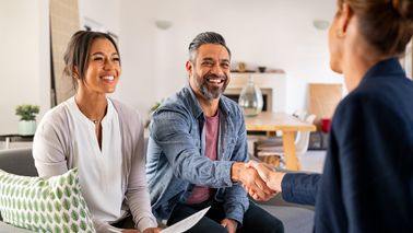 Discussing charitable giving tax strategy with financial advisor