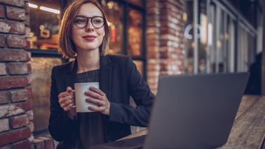 Woman thinking about what she read in Northwestern Mutual’s weekly market commentary.