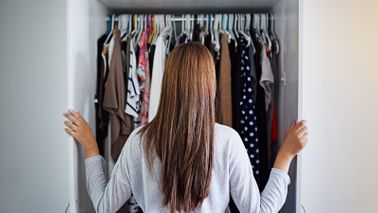 Woman looking in closet