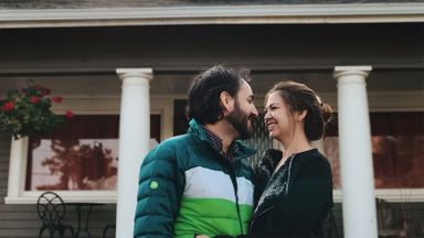 Happy couple moving in together