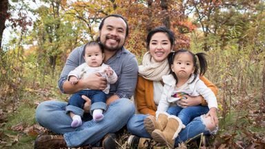 Touger and Mykou Thao with their children.