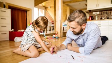 dad and daughter brainstorming home design